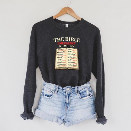 The Bible Book Of Emergency Numbers Religious Christian Raglan Sleeve Sweatshirt - Bookorys AU