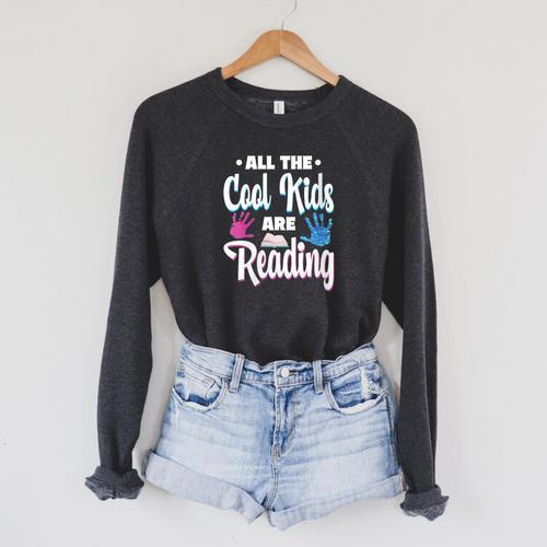All The Cool Kids Are Reading Book Vintage Retro Sunset Raglan Sleeve Sweatshirt - Bookorys DE