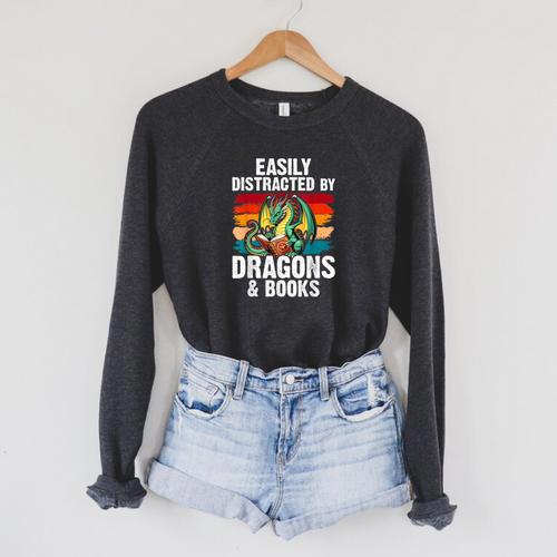 Dragon Reading Book Retro Vintage 80s Library Bookworm Raglan Sleeve Sweatshirt - Bookorys AU
