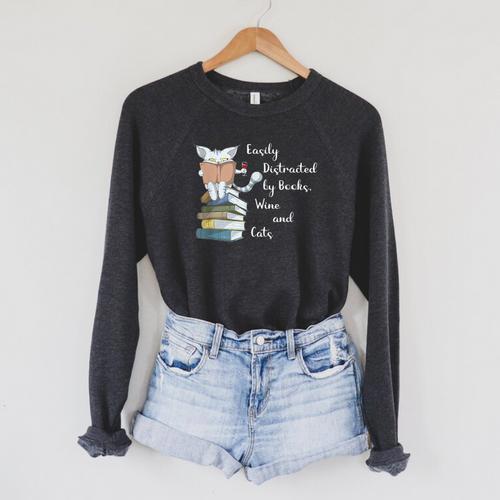 Easily Distracted By Books Wine And Cats Lover Raglan Sleeve Sweatshirt - Bookorys AU