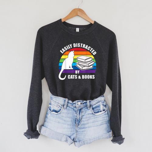 Easily Distracted By Cats And Books – Retro Sunset Rainbow Raglan Sleeve Sweatshirt - Bookorys AU