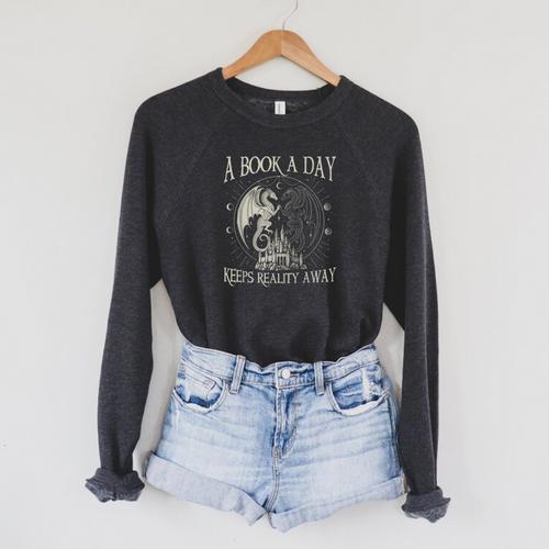 Fantasy Book Club Dragon Reader Book A Day Keep Reality Away Raglan Sleeve Sweatshirt - Bookorys