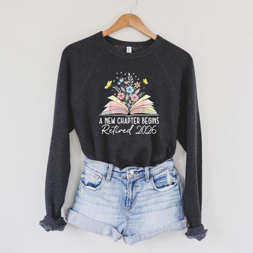 A New Chapter Begins Book Floral Bloom Raglan Sleeve Sweatshirt - Bookorys