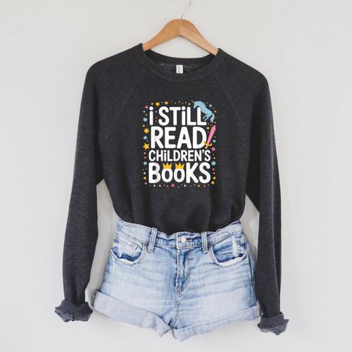 I Still Read Children Books Shirts Unicorn Reading Librarian Raglan Sleeve Sweatshirt - Bookorys CA