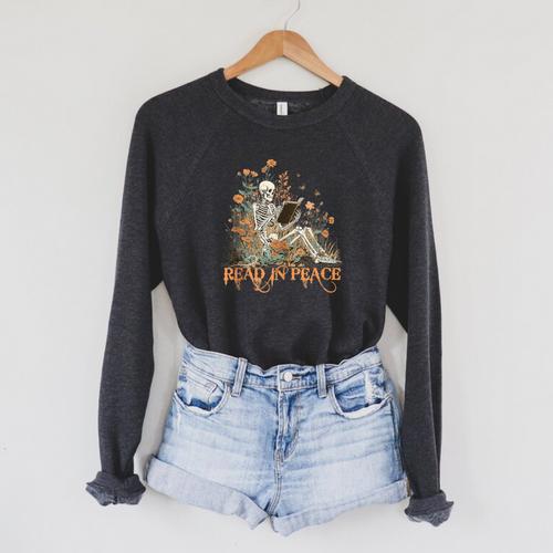 Read In Peace Skeleton Reading Book Halloween Bookish Raglan Sleeve Sweatshirt - Bookorys CA