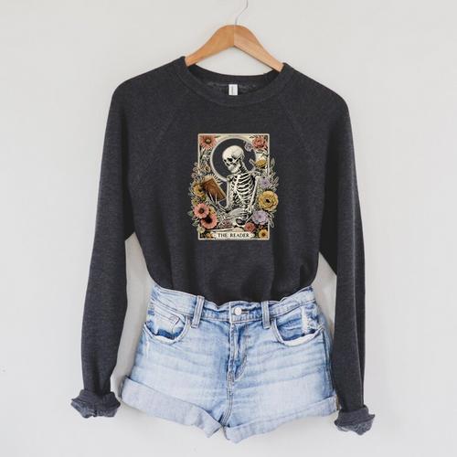The Reader Tarot Card Skeleton Reading Book Raglan Sleeve Sweatshirt - Bookorys