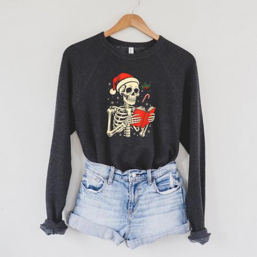 Skeleton Reading Book Christmas Teacher Librarian Book Lover Raglan Sleeve Sweatshirt - Bookorys DE