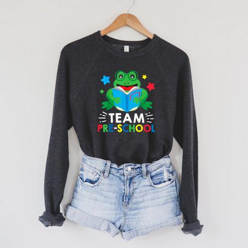 Team Pre-School Reading Frog Back To School Book Lover Raglan Sleeve Sweatshirt - Bookorys UK