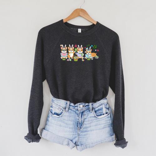 Women's Group Bunny Corgis Easter Reading Book Hunting Eggs Owner Raglan Sleeve Sweatshirt - Bookorys CA