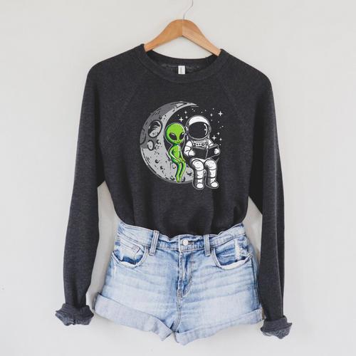 Astronaut Reading Book To Alien Moon Space Women Kids Men Premium Tri-Blend Raglan Sleeve Sweatshirt - Bookorys DE