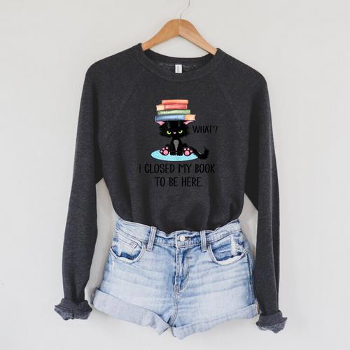 I Closed My Book To Be Here Cat What Cat Books Lovers Raglan Sleeve Sweatshirt - Bookorys