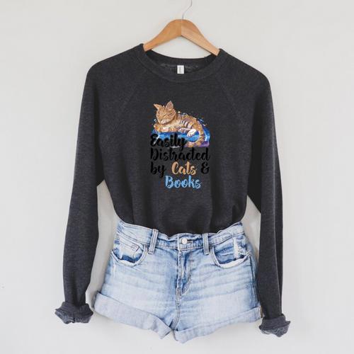 Easily Distracted By Cats And Books For Cat Lovers Men Women Kids Raglan Sleeve Sweatshirt - Bookorys AU