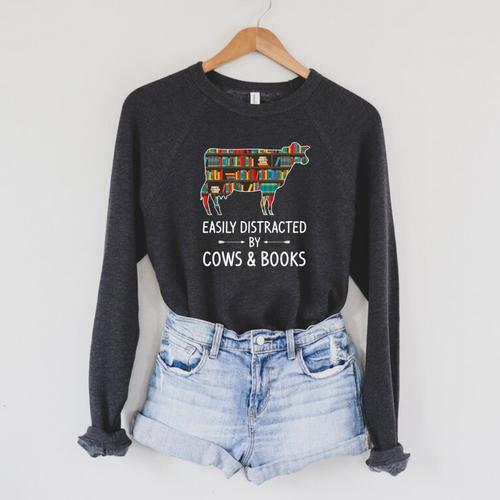 Easily Distracted By Cows & Books Lover Heifer Farm Raglan Sleeve Sweatshirt - Bookorys UK