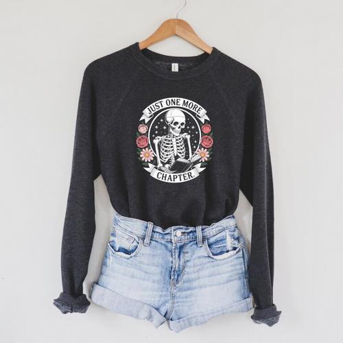 Just One More Chapter Gothic Skeleton Reading A Book Comfort Colors Crop Top Raglan Sleeve Sweatshirt - Bookorys UK