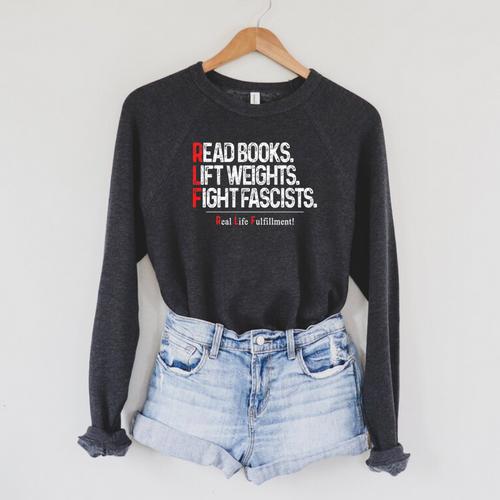 Read Books Lift Weights Fight Fascists Real Life Fulfillment Premium Tri-Blend Raglan Sleeve Sweatshirt - Bookorys DE