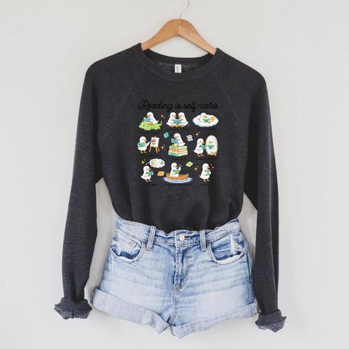 Reading Is Self Care Bookworm Reading Book Lovers Raglan Sleeve Sweatshirt - Bookorys