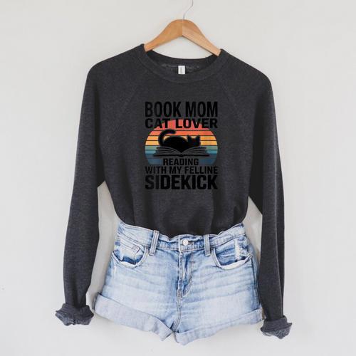 Women's Book Mom Cat Lover Reading With My Felline Sidekick Raglan Sleeve Sweatshirt - Bookorys AU