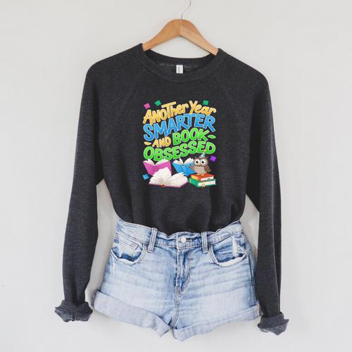 Another Year Smarter And Book-Obsessed Birthday Graphic Raglan Sleeve Sweatshirt - Bookorys