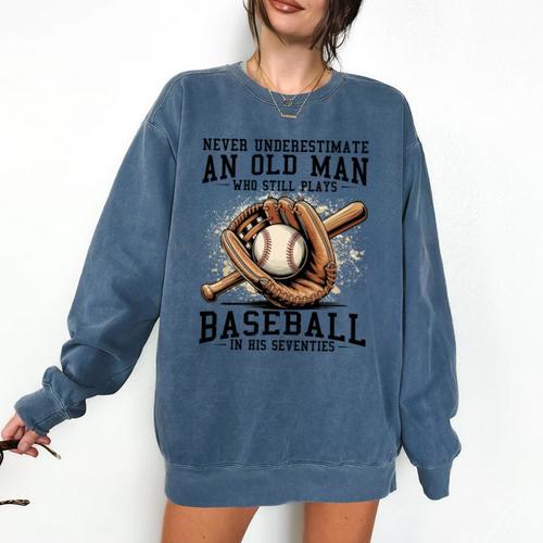 Never Underestimate Old Man Plays Baseball In His Seventies Comfort Colors Sweatshirt - Sportilla