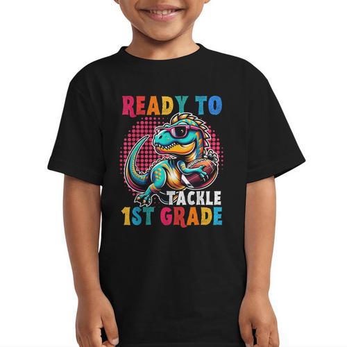 First Day Back To School 1st Grade Boys Football Dinosaur Graphic Kid T-Shirt - Savourry