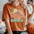 Promoted To Grandma Expecting Baby Daisy Groovy Wildflower レディースオーバーサイズコンフォートTシャツ Yam