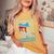 Catch The Blue Waveurfing Democrat Donkey Midterm Election レディースオーバーサイズコンフォートTシャツ Mustard