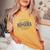 Romania レトロなスタイルのヴィンテージルーマニア レディースオーバーサイズコンフォートTシャツ Mustard Romania レトロなスタイルのヴィンテージルーマニア レディースオーバーサイズコンフォートTシャツ Mustard