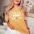 Soon To Be Mom 2026 Loading Promoted To Mommy First Time Mom レディースオーバーサイズコンフォートTシャツ Mustard