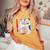 Waifu セクシー アニメ 女の子 メガネ 角 和風 レディースオーバーサイズコンフォートTシャツ Mustard