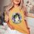 かわいい フラワー シェルティ 夏 花柄 シェットランド シープドッグ レディースオーバーサイズコンフォートTシャツ Mustard かわいい フラワー シェルティ 夏 花柄 シェットランド シープドッグ レディースオーバーサイズコンフォートTシャツ Mustard