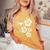 ハチドリ、ハイビスカス、花、男性、女性、子供 Tropical Hummingbird Hibiscus Flowers レディースオーバーサイズコンフォートTシャツ Mustard
