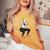 ボディービルダー 脚の日 女の子 ケトルベル フィットネス ボディービル レディースオーバーサイズコンフォートTシャツ Mustard