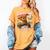 Baseball Player Christmas Gingerbread Smashing Through Snow Women's Comfort Colors T-Shirt Mustard