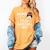 Moms Against White Baseball Pants For a Baseball Mom Women's Comfort Colors T-Shirt Mustard Moms Against White Baseball Pants For a Baseball Mom Women's Comfort Colors T-Shirt Mustard