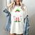 The Baseball Elf Christmas Sport Lovers Xmas Elf Women's Comfort Colors T-Shirt Ivory The Baseball Elf Christmas Sport Lovers Xmas Elf Women's Comfort Colors T-Shirt Ivory
