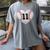 Baseball Number 11 Distressed Heart For Baseball Moms Women's Comfort Colors T-Shirt Gray Baseball Number 11 Distressed Heart For Baseball Moms Women's Comfort Colors T-Shirt Gray