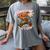 Baseball Player Christmas Gingerbread Smashing Through Snow Women's Comfort Colors T-Shirt Gray