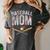 Baseball Mom Crossed Bats With Ball On Fire Distressed Women's Comfort Colors T-Shirt Pepper Baseball Mom Crossed Bats With Ball On Fire Distressed Women's Comfort Colors T-Shirt Pepper