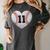 Baseball Number 11 Distressed Heart For Baseball Moms Women's Comfort Colors T-Shirt Pepper Baseball Number 11 Distressed Heart For Baseball Moms Women's Comfort Colors T-Shirt Pepper