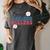 Busy Raising Ballers Retro Groovy Baseball Mom Outfit Women's Comfort Colors T-Shirt Pepper