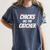Baseball Seams Chicks Dig The Catcher Women's Comfort Colors T-Shirt Moss