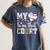 My Heart Is On That Court Baseball Player Baseball Mom Women's Comfort Colors T-Shirt Moss My Heart Is On That Court Baseball Player Baseball Mom Women's Comfort Colors T-Shirt Moss