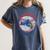 Lynyrd Skynyrd Skeleton Baseball Gun US Flag Cowboy Rock Fan Women's Comfort Colors T-Shirt Moss Lynyrd Skynyrd Skeleton Baseball Gun US Flag Cowboy Rock Fan Women's Comfort Colors T-Shirt Moss