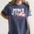 Mima Rookie Of Year 1st Birthday Baseball Theme Matching Women's Comfort Colors T-Shirt Moss Mima Rookie Of Year 1st Birthday Baseball Theme Matching Women's Comfort Colors T-Shirt Moss