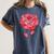 Sporty Rose Graphic With Baseball And Rugby Ball Petals Women's Comfort Colors T-Shirt Moss Sporty Rose Graphic With Baseball And Rugby Ball Petals Women's Comfort Colors T-Shirt Moss