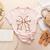 Coquette Bow Baseball Mama Baseball Mom Women Women's Heather T-Shirt Heather Peach