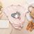 That's My Boy Leopard Heart Baseball Mom Women's Heather T-Shirt Heather Peach That's My Boy Leopard Heart Baseball Mom Women's Heather T-Shirt Heather Peach