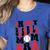 In My Baseball Mom Era Groovy Mom Women's Heather T-Shirt Heather True Royal