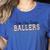 Kinda Busy Raising Ballers Funny Baseball Mom Mother's Day Women's Heather T-Shirt Heather True Royal Kinda Busy Raising Ballers Funny Baseball Mom Mother's Day Women's Heather T-Shirt Heather True Royal