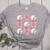 Baseballs And Bows Coquette Baseball Mom Baseball Coach Girl Women's Heather T-Shirt Athletic Heather Baseballs And Bows Coquette Baseball Mom Baseball Coach Girl Women's Heather T-Shirt Athletic Heather